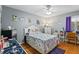 Bedroom with a double bed and wood floors at 15 Escondido Cir # 141, Altamonte Springs, FL 32701