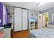 Bedroom with double closet and wood floors at 15 Escondido Cir # 141, Altamonte Springs, FL 32701