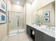 Elegant bathroom with double vanity, large shower, and modern fixtures at 7740 Sandy Ridge Dr # 225, Reunion, FL 34747