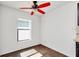 Bright dining area with ceiling fan and hardwood flooring at 1602 Steely Dr, Dundee, FL 33838