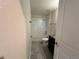 Clean bathroom with a tub and shower combination at 11845 Ginsberg Pl, Orlando, FL 32832