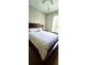 Bedroom with a king-size bed and ample natural light at 6335 Contessa Dr # 205, Orlando, FL 32829