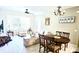 Bright living room with comfortable seating and a dining area at 6335 Contessa Dr # 205, Orlando, FL 32829