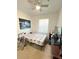 Bedroom with a double bed, TV, and window at 6335 Contessa Dr # 205, Orlando, FL 32829
