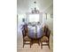 Dining room with an oval table and chairs at 6335 Contessa Dr # 205, Orlando, FL 32829