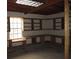 Spacious unfinished basement with built-in shelving at 1632 N Fullers Cross Rd, Winter Garden, FL 34787