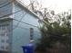 Side of house with garage and additional upper story at 1632 N Fullers Cross Rd, Winter Garden, FL 34787