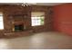 Living room with brick fireplace and tile floors at 1632 N Fullers Cross Rd, Winter Garden, FL 34787