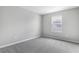 Well-lit bedroom with carpet and single window at 4236 Sawtooth Ct, Tavares, FL 32778