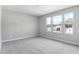 Spacious bedroom with carpeting and large windows at 4236 Sawtooth Ct, Tavares, FL 32778