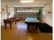Game room with foosball table and billiard table at 2143 Victoria Dr, Davenport, FL 33837
