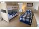 Bedroom with twin and full-size beds at 2143 Victoria Dr, Davenport, FL 33837