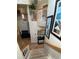 View of a grand staircase overlooking the living area at 2143 Victoria Dr, Davenport, FL 33837
