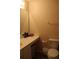 Bathroom with single sink vanity and toilet at 624 Gull Dr, Poinciana, FL 34759