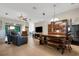 Charming dining area with rustic table and built-in cabinetry at 500 Playa Dr, Davenport, FL 33837
