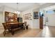 Charming dining area with a wooden table, bench seating, and decorative plates at 500 Playa Dr, Davenport, FL 33837