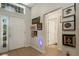 Bright entryway with tile flooring and an array of framed wall art at 500 Playa Dr, Davenport, FL 33837