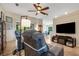 Spacious living area with comfortable recliners and a large TV at 500 Playa Dr, Davenport, FL 33837