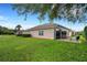 House exterior with backyard and patio furniture at 500 Playa Dr, Davenport, FL 33837