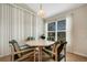 Bright breakfast nook with hexagonal table and four chairs at 500 Playa Dr, Davenport, FL 33837