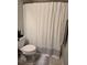 Simple bathroom with toilet and shower/tub combo at 834 S Donnelly St, Eustis, FL 32726