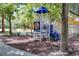 playground with playset and shaded area at 8842 Villa View Cir # 205, Orlando, FL 32821