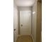 Bright hallway with neutral walls and carpet at 11460 Chateaubriand Ave, Orlando, FL 32836