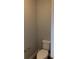 Small powder room with toilet and pedestal sink at 11460 Chateaubriand Ave, Orlando, FL 32836