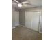 Spacious bedroom with double door closet and ceiling fan at 11460 Chateaubriand Ave, Orlando, FL 32836
