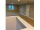 Spacious bonus room with neutral walls and carpet at 11460 Chateaubriand Ave, Orlando, FL 32836