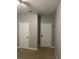Two-door bedroom with neutral walls and carpet at 11460 Chateaubriand Ave, Orlando, FL 32836