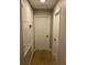 Hallway with neutral walls and carpet at 11460 Chateaubriand Ave, Orlando, FL 32836