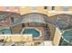 Enclosed pool area with patio furniture, providing a private oasis at 8545 Bay Lilly Loop, Kissimmee, FL 34747