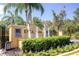 Encantada community entrance with water feature and landscaping at 8545 Bay Lilly Loop, Kissimmee, FL 34747
