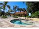 Relaxing community spa surrounded by lush landscaping at 8545 Bay Lilly Loop, Kissimmee, FL 34747