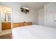 Bedroom with a double bed, dresser, en-suite bathroom access, and TV at 8545 Bay Lilly Loop, Kissimmee, FL 34747