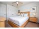 Light and airy bedroom with a double bed and built-in wardrobe at 8545 Bay Lilly Loop, Kissimmee, FL 34747