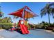 playground with shade structure and play equipment at 8545 Bay Lilly Loop, Kissimmee, FL 34747