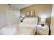 Bright bedroom with double bed and neutral color scheme at 5144 Adelaide Dr, Kissimmee, FL 34746