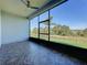 Relaxing screened porch overlooking scenic backyard at 3510 Mediterra Dr, Clermont, FL 34711