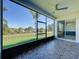 Spacious screened porch with scenic lake view at 3510 Mediterra Dr, Clermont, FL 34711