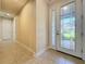 Elegant entryway with glass-paned front door at 3510 Mediterra Dr, Clermont, FL 34711