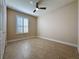 Bedroom with plantation shutters, ceiling fan and tile floors at 3510 Mediterra Dr, Clermont, FL 34711