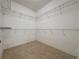 Spacious walk-in closet with wire shelving at 3510 Mediterra Dr, Clermont, FL 34711
