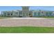 Community clubhouse with teal accents and welcoming entrance at 5006 Sunfalls Ave, Saint Cloud, FL 34772
