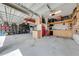 Large garage with workshop and ample storage at 2867 Matera Dr, St Cloud, FL 34771