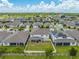Aerial view of home, backyard and neighborhood at 2867 Matera Dr, St Cloud, FL 34771