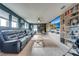 Spacious game room with large sectional sofa and entertainment center at 2867 Matera Dr, St Cloud, FL 34771