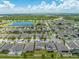 Aerial view of community with lake and homes at 2867 Matera Dr, St Cloud, FL 34771