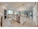 Open kitchen with island, pantry and stainless steel appliances at 2867 Matera Dr, St Cloud, FL 34771